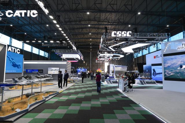 (260917) -- PRETORIA, Sept. 17, 2026 (Xinhua) -- People visit the Africa Aerospace and Defense (AAD) expo in Pretoria, South Africa, Sept. 16, 2026. The 25th AAD expo kicked off at Air Force Base Waterkloof here on Wednesday, and the event will run until Sept. 20. (Xinhua/Chen Wei)