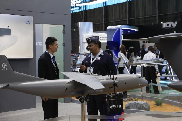 (260917) -- PRETORIA, Sept. 17, 2026 (Xinhua) -- People visit the booth of a Chinese exhibitor at the Africa Aerospace and Defense (AAD) expo in Pretoria, South Africa, Sept. 16, 2026. The 25th AAD expo kicked off at Air Force Base Waterkloof here on Wednesday, and the event will run until Sept. 20. (Xinhua/Chen Wei)