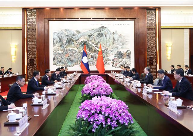 (260917) -- NANNING, Sept. 17, 2026 (Xinhua) -- Chinese Vice Premier Ding Xuexiang, also a member of the Standing Committee of the Political Bureau of the Communist Party of China Central Committee, meets with Lao Deputy Prime Minister Saleumxay Kommasith, who is in China to attend the 23rd China-ASEAN Expo and China-ASEAN Business and Investment Summit, in Nanning, south China's Guangxi Zhuang Autonomous Region, Sept. 16, 2026. (Xinhua/Liu Weibing)