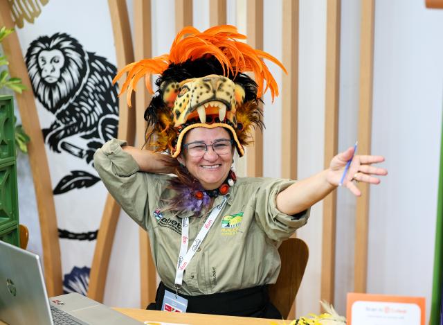 (260917) -- PARIS, Sept. 17, 2026 (Xinhua) -- An exhibition staff member dressed in a distinctive outfit poses for photos at the International & French Travel Market (IFTM) in Paris, France, Sept. 17, 2026. The three-day IFTM, an international tourism trade show, concluded in Paris on Thursday. (Xinhua/Wu Huiwo)
