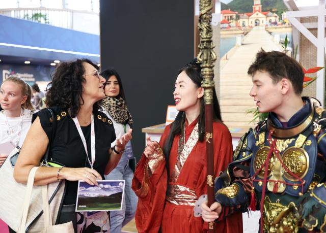 (260917) -- PARIS, Sept. 17, 2026 (Xinhua) -- People talk at the International & French Travel Market (IFTM) in Paris, France, Sept. 17, 2026. The three-day IFTM, an international tourism trade show, concluded in Paris on Thursday. (Xinhua/Wu Huiwo)