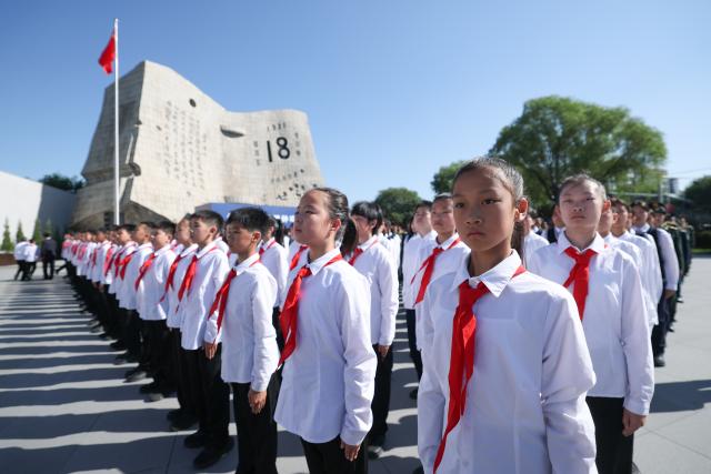(260918) -- SHENYANG, Sept. 18, 2026 (Xinhua) -- A ceremony to commemorate the September 18 Incident is held at the square of the 9.18 Historical Museum in Shenyang, northeast China's Liaoning Province, Sept. 18, 2026. A bell tolled at the square of the 9.18 Historical Museum in Shenyang on Friday to commemorate the 95th anniversary of the September 18 Incident, which marked the start of the Chinese People's War of Resistance against Japanese Aggression. (Xinhua/Pan Yulong)