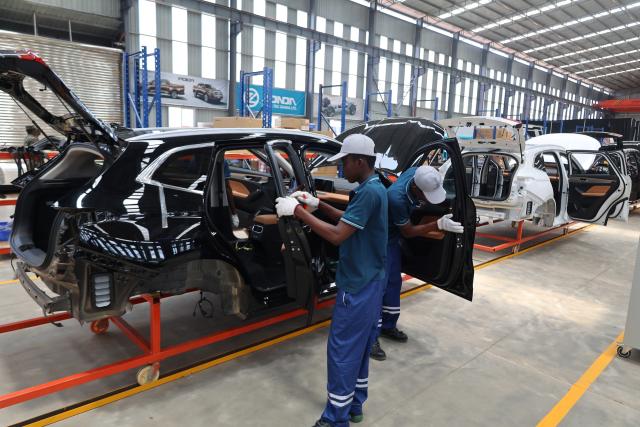 (260917) -- ACCRA, Sept. 17, 2026 (Xinhua) -- Local staff members work on a production line at a workshop of Zonda Tec Ghana Limited in Greater Accra Region, Ghana, Sept. 15, 2026. TO GO WITH "Ghanaian president inaugurates Chinese automobile assembly plant" (Xinhua/Seth)