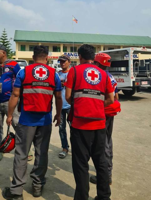 (260918) -- MANILA, Sept. 18, 2026 (Xinhua) -- Volunteers from the Philippine Red Cross are pictured at the site of a school shooting at a high school in the municipality of Banga, South Cotabato Province, the Philippines, Sept. 18, 2026. At least six people were killed and 17 others injured in a school shooting in southern Philippines on Friday, according to the Department of Social Welfare and Development (DSWD). (Philippine Red Cross/Handout via Xinhua)