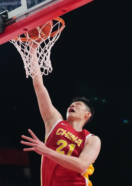 (260918) -- NAGOYA, Sept. 18, 2026 (Xinhua) -- Hu Jinqiu of China dunks during the men's semifinal basketball match between China and Japan at the 20th Asian Games Aichi-Nagoya 2026 in Nagoya, Japan, Sept. 18, 2026. (Xinhua/Luo Yuan)