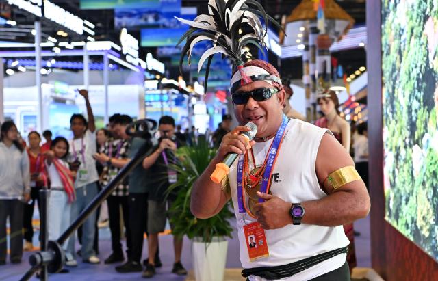 (260918) -- NANNING, Sept. 18, 2026 (Xinhua) -- A man from Timor-Leste performs during the 23rd China-ASEAN Expo in Nanning, south China's Guangxi Zhuang Autonomous Region, Sept. 18, 2026. Various cultural performances have become highlights of the ongoing 23rd China-ASEAN Expo. (Xinhua/Lu Boan)