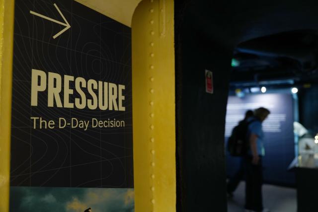 (260918) -- LONDON, Sept. 18, 2026 (Xinhua) -- Photo taken on Sept. 16, 2026 shows a display compartment for the film Pressure on HMS Belfast, a former Royal Navy light cruiser, in London, Britain. TO GO WITH "Feature: From D-Day to present, HMS Belfast reflects changing political landscape" (Xinhua/Zhang Feng)