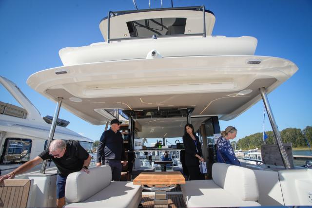 (260919) -- DELTA, Sept. 19, 2026 (Xinhua) -- People look inside a yacht during the Vancouver International Boat Show Fall Marina Show and Sale in Delta, British Columbia, Canada, Sept. 18, 2026. The three-day event kicked off here on Friday, showcasing boats and a wide range of marine products. (Photo by Liang Sen/Xinhua)