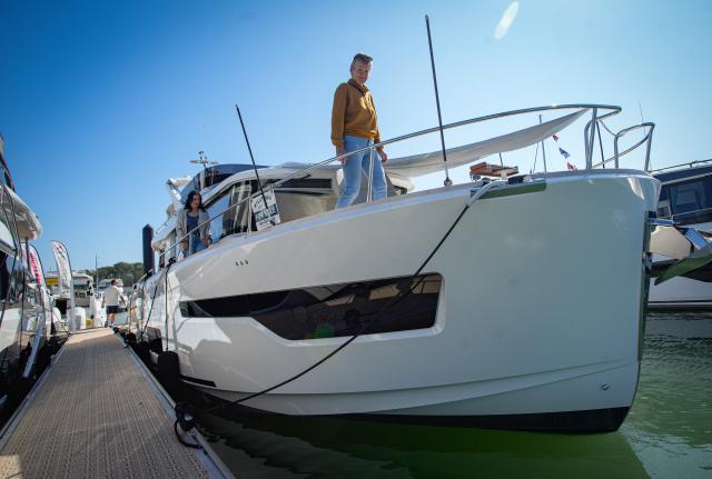 (260919) -- DELTA, Sept. 19, 2026 (Xinhua) -- A woman walks on the deck of a yacht during the Vancouver International Boat Show Fall Marina Show and Sale in Delta, British Columbia, Canada, Sept. 18, 2026. The three-day event kicked off here on Friday, showcasing boats and a wide range of marine products. (Photo by Liang Sen/Xinhua)
