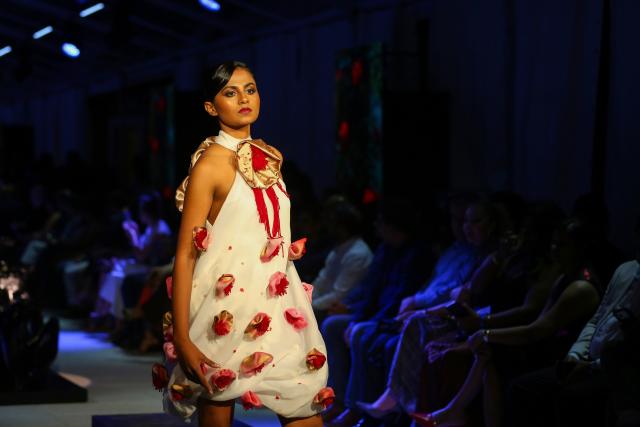 (260919) -- COLOMBO, Sept. 19, 2026 (Xinhua) -- A model showcases a design during the "Couture + Trousseau" special event of Colombo Fashion Week in Colombo, Sri Lanka, on Sept. 17, 2026. The event, running from Sept. 17 to 19, features collections by Sri Lankan designers as well as designers from India, China, and Pakistan. (Photo by Ajith Perera/Xinhua)