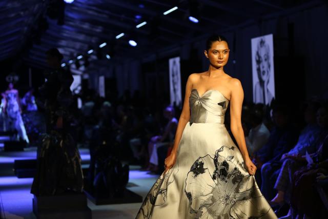 (260919) -- COLOMBO, Sept. 19, 2026 (Xinhua) -- A model showcases a design during the "Couture + Trousseau" special event of Colombo Fashion Week in Colombo, Sri Lanka, on Sept. 17, 2026. The event, running from Sept. 17 to 19, features collections by Sri Lankan designers as well as designers from India, China, and Pakistan. (Photo by Ajith Perera/Xinhua)