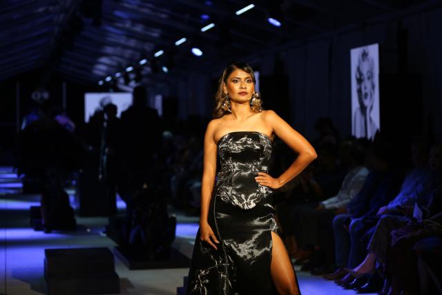 (260919) -- COLOMBO, Sept. 19, 2026 (Xinhua) -- A model showcases a design during the "Couture + Trousseau" special event of Colombo Fashion Week in Colombo, Sri Lanka, on Sept. 17, 2026. The event, running from Sept. 17 to 19, features collections by Sri Lankan designers as well as designers from India, China, and Pakistan. (Photo by Ajith Perera/Xinhua)