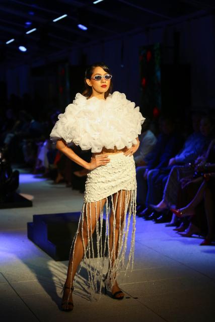 (260919) -- COLOMBO, Sept. 19, 2026 (Xinhua) -- A model showcases a design during the "Couture + Trousseau" special event of Colombo Fashion Week in Colombo, Sri Lanka, on Sept. 17, 2026. The event, running from Sept. 17 to 19, features collections by Sri Lankan designers as well as designers from India, China, and Pakistan. (Photo by Ajith Perera/Xinhua)