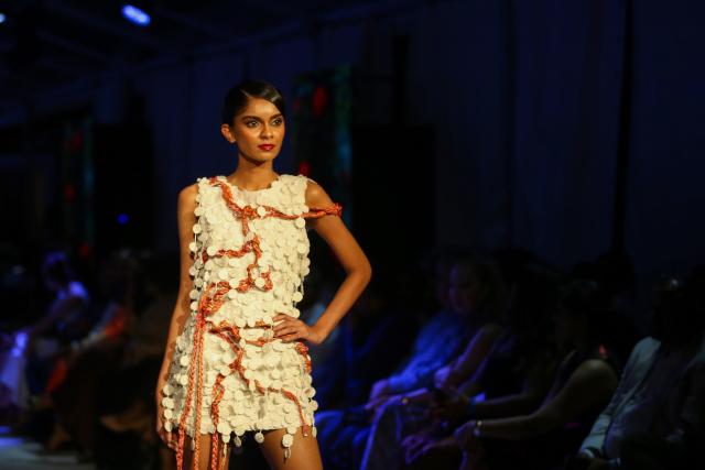 (260919) -- COLOMBO, Sept. 19, 2026 (Xinhua) -- A model showcases a design during the "Couture + Trousseau" special event of Colombo Fashion Week in Colombo, Sri Lanka, on Sept. 17, 2026. The event, running from Sept. 17 to 19, features collections by Sri Lankan designers as well as designers from India, China, and Pakistan. (Photo by Ajith Perera/Xinhua)