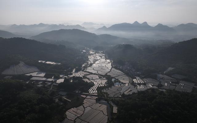 (260919) -- GUILIN, Sept. 19, 2026 (Xinhua) -- An aerial drone photo taken on Aug. 11, 2026 shows a view of grape gardens in Maozhushan Village of Quanzhou County of Guilin City, south China's Guangxi Zhuang Autonomous Region. In the winter of 1934 during the Long March, the Red Army fought its way across the Xiangjiang River in Guangxi and broke through the Kuomintang troops' blockade, but suffered tens of thousands of casualties in the battle.
   In Quanzhou, Guanyang and Xing'an counties, where the Battle of the Xiangjiang River was fought, the spirit of the Long March has been passed down through generations. Today, roads wind through mountains that Red Army soldiers once crossed on foot, connecting once-isolated villages with the outside world. Local people keep striving on the path of rural revitalization. (Xinhua/Huang Xiaobang)