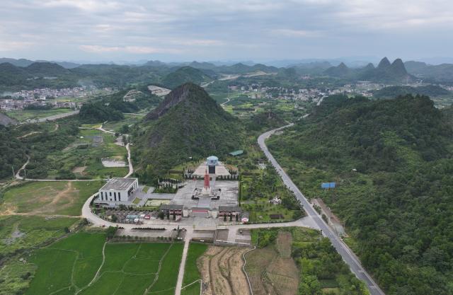 (260919) -- GUILIN, Sept. 19, 2026 (Xinhua) -- An aerial drone photo taken on Aug. 10, 2026 shows a memorial park for a blocking battle during the Battle of the Xiangjiang River in Guanyang County of Guilin City, south China's Guangxi Zhuang Autonomous Region. In the winter of 1934 during the Long March, the Red Army fought its way across the Xiangjiang River in Guangxi and broke through the Kuomintang troops' blockade, but suffered tens of thousands of casualties in the battle.
   In Quanzhou, Guanyang and Xing'an counties, where the Battle of the Xiangjiang River was fought, the spirit of the Long March has been passed down through generations. Today, roads wind through mountains that Red Army soldiers once crossed on foot, connecting once-isolated villages with the outside world. Local people keep striving on the path of rural revitalization. (Xinhua/Zhang Ailin)