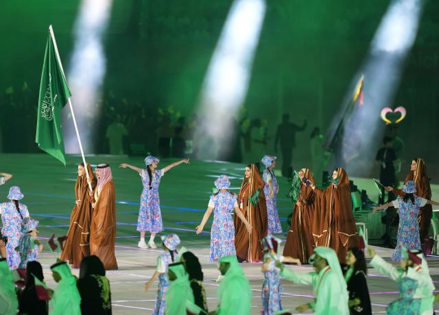 (260919) -- NAGOYA, Sept. 19, 2026 (Xinhua) -- The delegation of Saudi Arabia parades into the stadium during the opening ceremony of the 20th Asian Games Aichi-Nagoya 2026 in Nagoya, Japan, Sept. 19, 2026. (Xinhua/Lui Siu Wai)