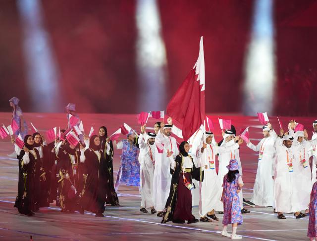 (260919) -- NAGOYA, Sept. 19, 2026 (Xinhua) -- The delegation of Qatar parades into the stadium during the opening ceremony of the 20th Asian Games Aichi-Nagoya 2026 in Nagoya, Japan, Sept. 19, 2026. (Xinhua/Lui Siu Wai)