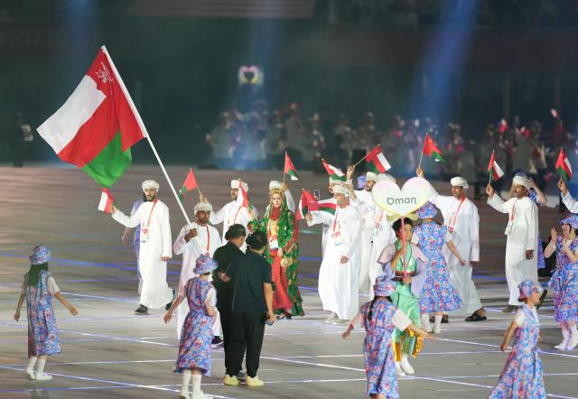 (260919) -- NAGOYA, Sept. 19, 2026 (Xinhua) -- The delegation of Oman parades into the stadium during the opening ceremony of the 20th Asian Games Aichi-Nagoya 2026 in Nagoya, Japan, Sept. 19, 2026. (Xinhua/Lui Siu Wai)