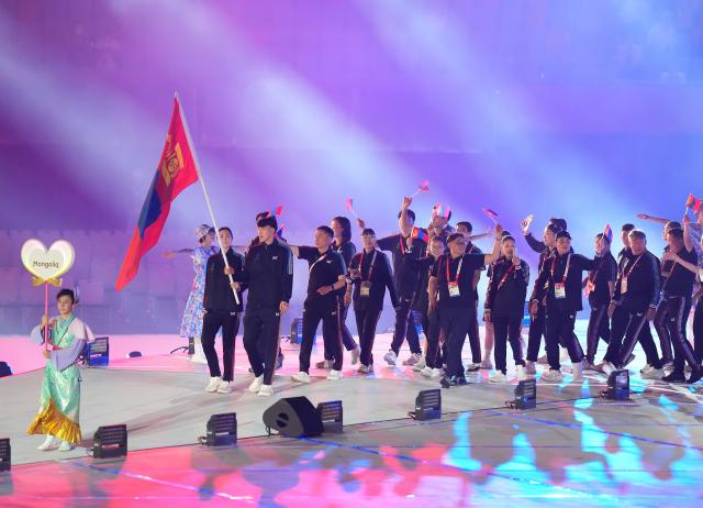 (260919) -- NAGOYA, Sept. 19, 2026 (Xinhua) -- The delegation of Mongolia parades into the stadium during the opening ceremony of the 20th Asian Games Aichi-Nagoya 2026 in Nagoya, Japan, Sept. 19, 2026. (Xinhua/Lui Siu Wai)
