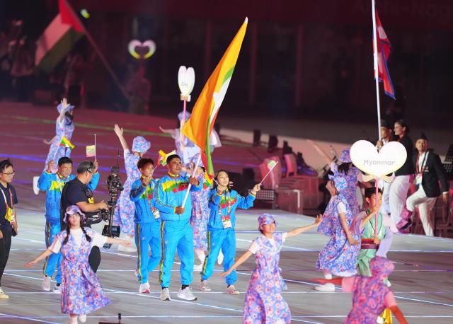 (260919) -- NAGOYA, Sept. 19, 2026 (Xinhua) -- The delegation of Myanmar parades into the stadium during the opening ceremony of the 20th Asian Games Aichi-Nagoya 2026 in Nagoya, Japan, Sept. 19, 2026. (Xinhua/Lui Siu Wai)
