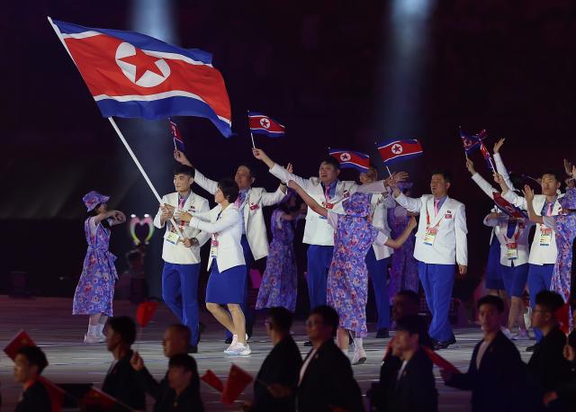 (260919) -- NAGOYA, Sept. 19, 2026 (Xinhua) -- Delegation of the Democratic People's Republic of Korea (DPRK) parades into the stadium during the opening ceremony of the 20th Asian Games Aichi-Nagoya 2026 in Nagoya, Japan, Sept. 19, 2026. (Xinhua/Li Bo)