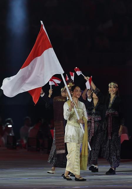 (260919) -- NAGOYA, Sept. 19, 2026 (Xinhua) -- Delegation of Indonesia parades into the stadium during the opening ceremony of the 20th Asian Games Aichi-Nagoya 2026 in Nagoya, Japan, Sept. 19, 2026. (Xinhua/Li Bo)