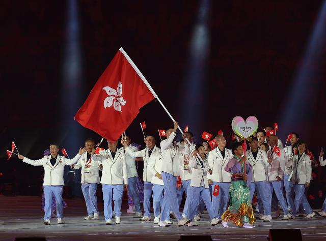 (260919) -- NAGOYA, Sept. 19, 2026 (Xinhua) -- Delegation of Hong Kong of China parades into the stadium during the opening ceremony of the 20th Asian Games Aichi-Nagoya 2026 in Nagoya, Japan, Sept. 19, 2026. (Xinhua/Li Bo)