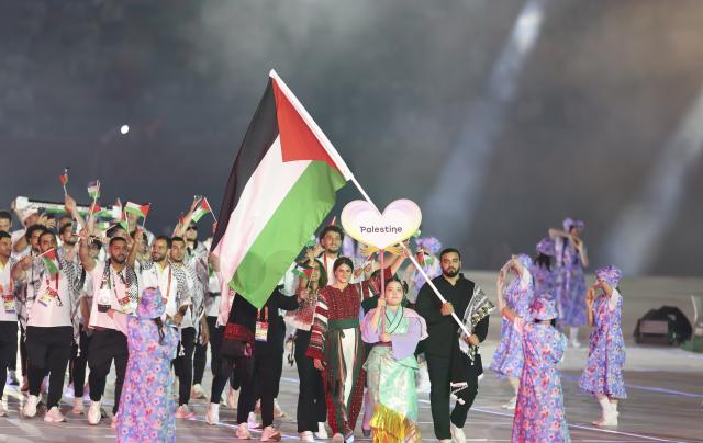 (260919) -- NAGOYA, Sept. 19, 2026 (Xinhua) -- The delegation of Palestine parades during the opening ceremony of the 20th Asian Games Aichi-Nagoya 2026 in Nagoya, Japan, Sept. 19, 2026. (Xinhua/Deng Hua)