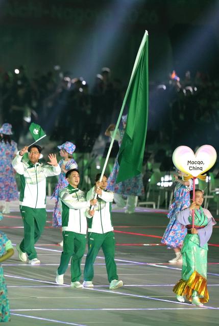 (260919) -- NAGOYA, Sept. 19, 2026 (Xinhua) -- The delegation of Macao of China parades into the stadium during the opening ceremony of the 20th Asian Games Aichi-Nagoya 2026 in Nagoya, Japan, Sept. 19, 2026. (Xinhua/Lui Siu Wai)