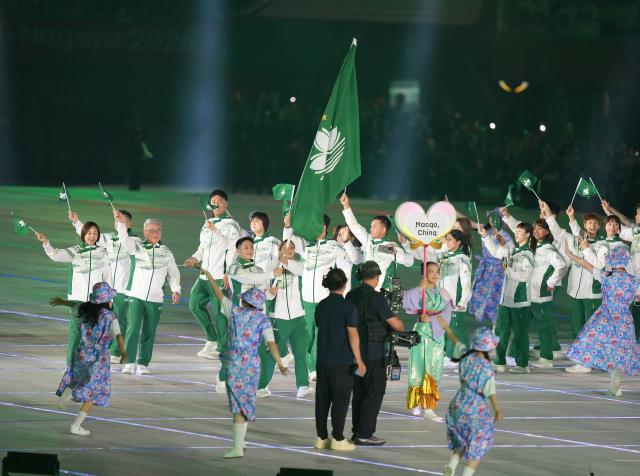 (260919) -- NAGOYA, Sept. 19, 2026 (Xinhua) -- The delegation of Macao of China parades into the stadium during the opening ceremony of the 20th Asian Games Aichi-Nagoya 2026 in Nagoya, Japan, Sept. 19, 2026. (Xinhua/Lui Siu Wai)