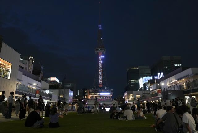 (260919) -- NAGOYA, Sept. 19, 2026 (Xinhua) -- People gather at the Chubu Electric Power Mirai Tower as the opening ceremony of the 20th Asian Games Aichi-Nagoya 2026 is held in Nagoya, Japan, Sept. 19, 2026. (Xinhua/Jia Yuchen)