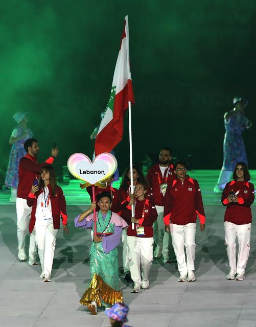 (260919) -- NAGOYA, Sept. 19, 2026 (Xinhua) -- The delegation of Lebanon parades into the stadium during the opening ceremony of the 20th Asian Games Aichi-Nagoya 2026 in Nagoya, Japan, Sept. 19, 2026. (Xinhua/Li Bo)