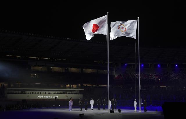 (260919) -- NAGOYA, Sept. 19, 2026 (Xinhua) -- The Japanese national flag and the Olympic Council of Asia (OCA) flag are raised during the opening ceremony of the 20th Asian Games Aichi-Nagoya 2026 in Nagoya, Japan, Sept. 19, 2026. (Xinhua/Cen Yunpeng)