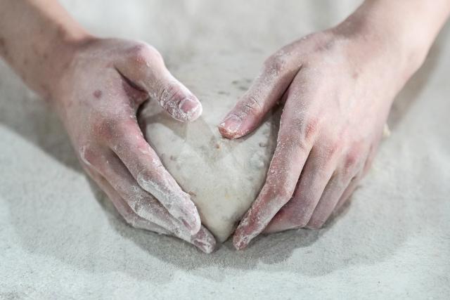 (260919) -- SUZHOU, Sept. 19, 2026 (Xinhua) -- Hou Jinchen makes bread based on his training plan at Suzhou Wuzhong Technician College in Suzhou, east China's Jiangsu Province, Aug. 27, 2026. Born in 2005, Hou Jinchen studies culinary arts at Suzhou Wuzhong Technician College. He began learning to bake at the age of 12, and his passion for it has grown ever since.
   From shaping dough to baking and decorating bread, Hou follows a rigorous training routine. He practices the same techniques over and over to build muscle memory, carefully recording changes in temperature and ingredient quantities during each session and constantly refining the details.
   Outside training, he also visits local bakeries to learn from working bakers. He believes they have a better understanding of consumer preferences, which gives him insights that training focused solely on competitions may not always provide.
   His efforts have earned him both gold and bronze medals in national vocational skills competitions, and he was later selected for the national team. The 21-year-old is now preparing for the upcoming WorldSkills Competition in Shanghai.
   Among all the competition tasks, Hou devotes particular attention to artistic bread design. From sketching ideas to making molds and baking the final pieces, the process requires repeated adjustments. He sometimes uses 3D-printed molds and plans to incorporate more Chinese elements into his competition pieces in Shanghai.
   For Hou, baking is not just a technical skill, but also a pursuit of craftsmanship. He hopes to showcase the skills and dedication of young Chinese bakers on the international stage.
   "I can't imagine leaving the baking industry," Hou said. "In the future, I hope to become a coach and pass on what I have learned to younger bakers." (Xinhua/Li Bo)