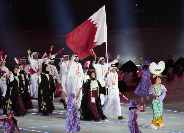(260919) -- NAGOYA, Sept. 19, 2026 (Xinhua) -- The delegation of Qatar parades into the stadium during the opening ceremony of the 20th Asian Games Aichi-Nagoya 2026 in Nagoya, Japan, Sept. 19, 2026. (Xinhua/Zhou Mi)