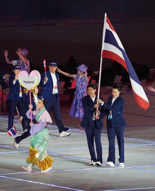 (260919) -- NAGOYA, Sept. 19, 2026 (Xinhua) -- The delegation of Thailand parades into the stadium during the opening ceremony of the 20th Asian Games Aichi-Nagoya 2026 in Nagoya, Japan, Sept. 19, 2026. (Xinhua/Zhou Mi)