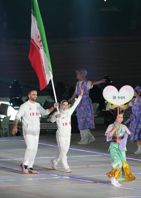 (260919) -- NAGOYA, Sept. 19, 2026 (Xinhua) -- The delegation of Iran parades into the stadium during the opening ceremony of the 20th Asian Games Aichi-Nagoya 2026 in Nagoya, Japan, Sept. 19, 2026. (Xinhua/Zhou Mi)