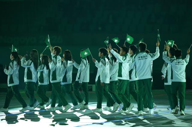 (260919) -- NAGOYA, Sept. 19, 2026 (Xinhua) -- The delegation of Macao of China parades into the stadium during the opening ceremony of the 20th Asian Games Aichi-Nagoya 2026 in Nagoya, Japan, Sept. 19, 2026. (Xinhua/Cheong Kam Ka)