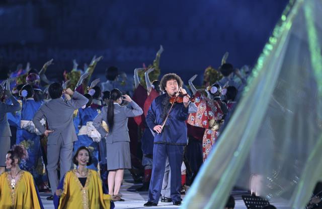 (260919) -- NAGOYA, Sept. 19, 2026 (Xinhua) -- Hakase Taro (C) of Japan performs during the opening ceremony of the 20th Asian Games Aichi-Nagoya 2026 in Nagoya, Japan, Sept. 19, 2026. (Xinhua/Yu Yang)