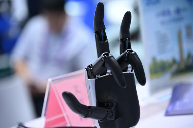 (260919) -- NANNING, Sept. 19, 2026 (Xinhua) -- This photo shows a dexterous hand for an embodied AI robot during the 23rd China-ASEAN Expo in Nanning, south China's Guangxi Zhuang Autonomous Region, Sept. 18, 2026. AI-related products have taken center stage at the ongoing 23rd China-ASEAN Expo, which attracts more than 3,400 companies from China, the Association of Southeast Asian Nations (ASEAN) and beyond. (Xinhua/Sun Huanjie)