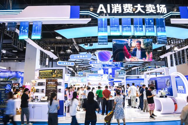 (260919) -- NANNING, Sept. 19, 2026 (Xinhua) -- People visit the sales area of AI-related products during the 23rd China-ASEAN Expo in Nanning, south China's Guangxi Zhuang Autonomous Region, Sept. 18, 2026. AI-related products have taken center stage at the ongoing 23rd China-ASEAN Expo, which attracts more than 3,400 companies from China, the Association of Southeast Asian Nations (ASEAN) and beyond. (Xinhua/Cao Yiming)