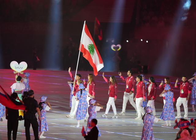 (260919) -- NAGOYA, Sept. 19, 2026 (Xinhua) -- The delegation of Lebanon parades into the stadium during the opening ceremony of the 20th Asian Games Aichi-Nagoya 2026 in Nagoya, Japan, Sept. 19, 2026. (Xinhua/Lui Siu Wai)