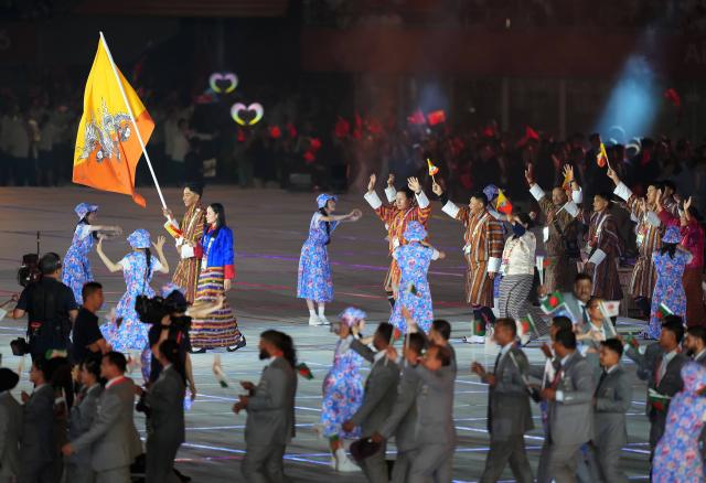 (260919) -- NAGOYA, Sept. 19, 2026 (Xinhua) -- The delegation of Bhutan parades into the stadium during the opening ceremony of the 20th Asian Games Aichi-Nagoya 2026 in Nagoya, Japan, Sept. 19, 2026. (Xinhua/Lui Siu Wai)
