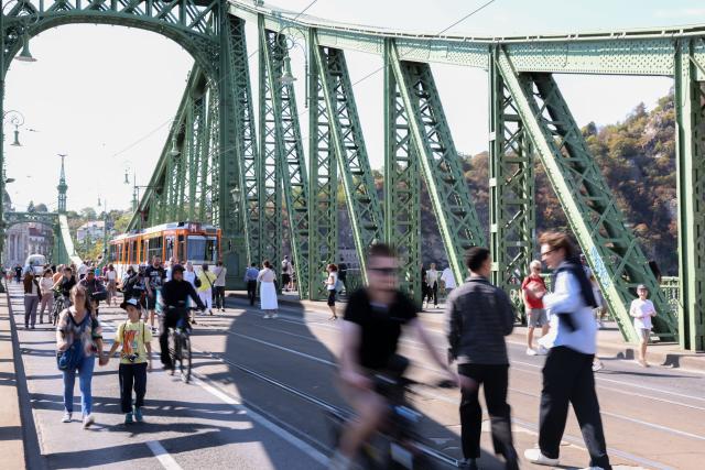 (260919) -- BUDAPEST, Sept. 19, 2026 (Xinhua) -- People attend a car-free weekend event in Budapest, Hungary, on Sept. 19, 2026. Budapest is holding a car-free weekend on Sept. 19-20 as part of European Mobility Week, promoting environmentally friendly and sustainable travel through public transport vehicle displays, cycling activities and family events. (Xinhua/Hu Zhixuan)