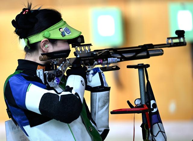 (260920) -- NAGOYA, Sept. 20, 2026 (Xinhua) -- Han Jiayu of team China competes during the 10m air rifle women team final of shooting at the 20th Asian Games Aichi-Nagoya 2026 in Toyota of Aichi Prefecture, Japan, Sept. 20, 2026. (Xinhua/Liu Lei)