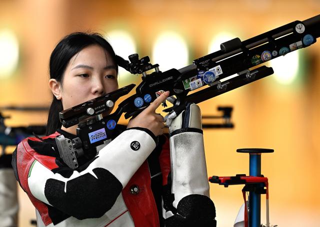(260920) -- NAGOYA, Sept. 20, 2026 (Xinhua) -- Wang Zifei of team China reacts during the 10m air rifle women team final of shooting at the 20th Asian Games Aichi-Nagoya 2026 in Toyota of Aichi Prefecture, Japan, Sept. 20, 2026. (Xinhua/Liu Lei)