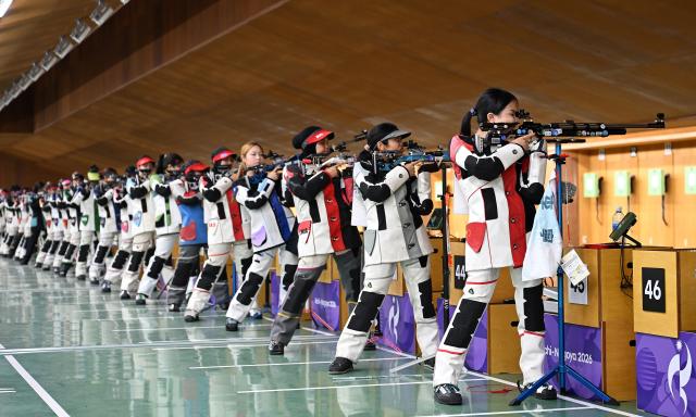 (260920) -- NAGOYA, Sept. 20, 2026 (Xinhua) -- Shooters compete during the 10m air rifle women team final of shooting at the 20th Asian Games Aichi-Nagoya 2026 in Toyota of Aichi Prefecture, Japan, Sept. 20, 2026. (Xinhua/Liu Lei)