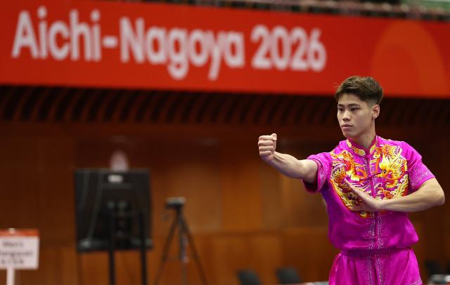 (260920) -- NAGOYA, Sept. 20, 2026 (Xinhua) -- Kuong Chi Hin of China's Macao competes during the Men's Changquan Final of Wushu at the 20th Asian Games Aichi-Nagoya 2026 in Nagoya of Aichi Prefecture, Japan, Sept. 20, 2026. (Xinhua/Wang Dongzhen)