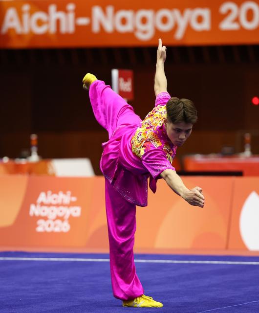 (260920) -- NAGOYA, Sept. 20, 2026 (Xinhua) -- Kuong Chi Hin of China's Macao competes during the Men's Changquan Final of Wushu at the 20th Asian Games Aichi-Nagoya 2026 in Nagoya of Aichi Prefecture, Japan, Sept. 20, 2026. (Xinhua/Wang Dongzhen)